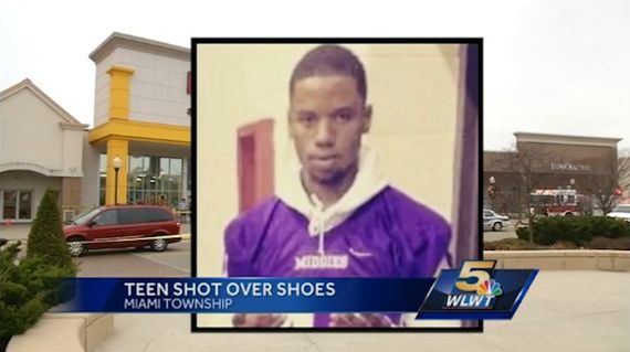teen shot over jordan XI legend blue_result