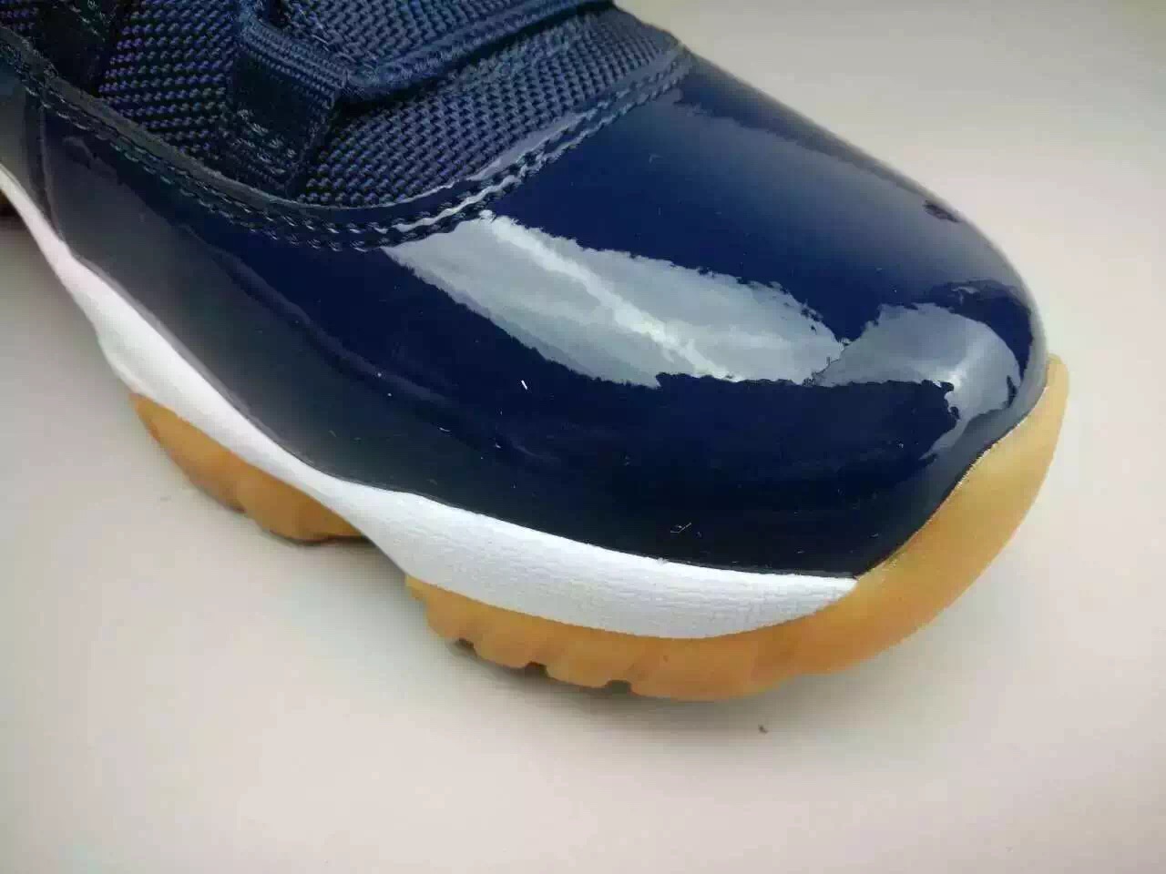 air-jordan-11-low-midnight-navy-gum-03