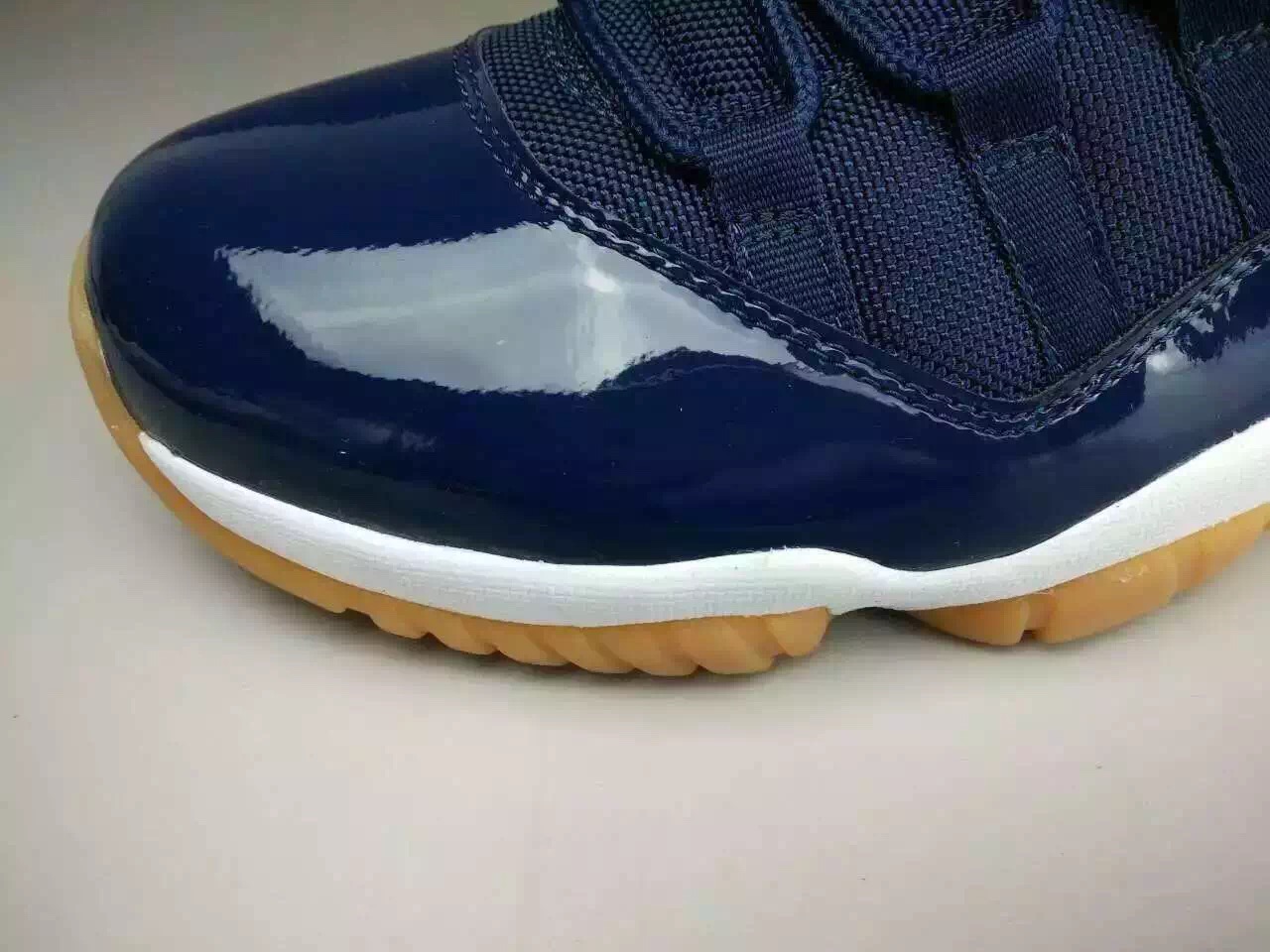 air-jordan-11-low-midnight-navy-gum-04