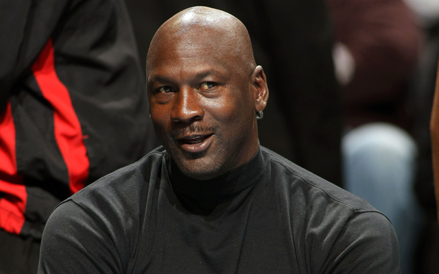 Here’s Michael Jordan stopping a dude from fighting his security guard